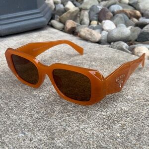 Prada Bold Amber Sunglasses